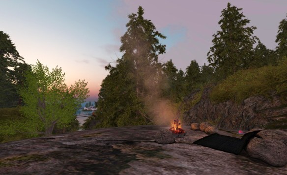 cuddle blanket & campfire  on Mirromere with The Dolphin Cafe in the background